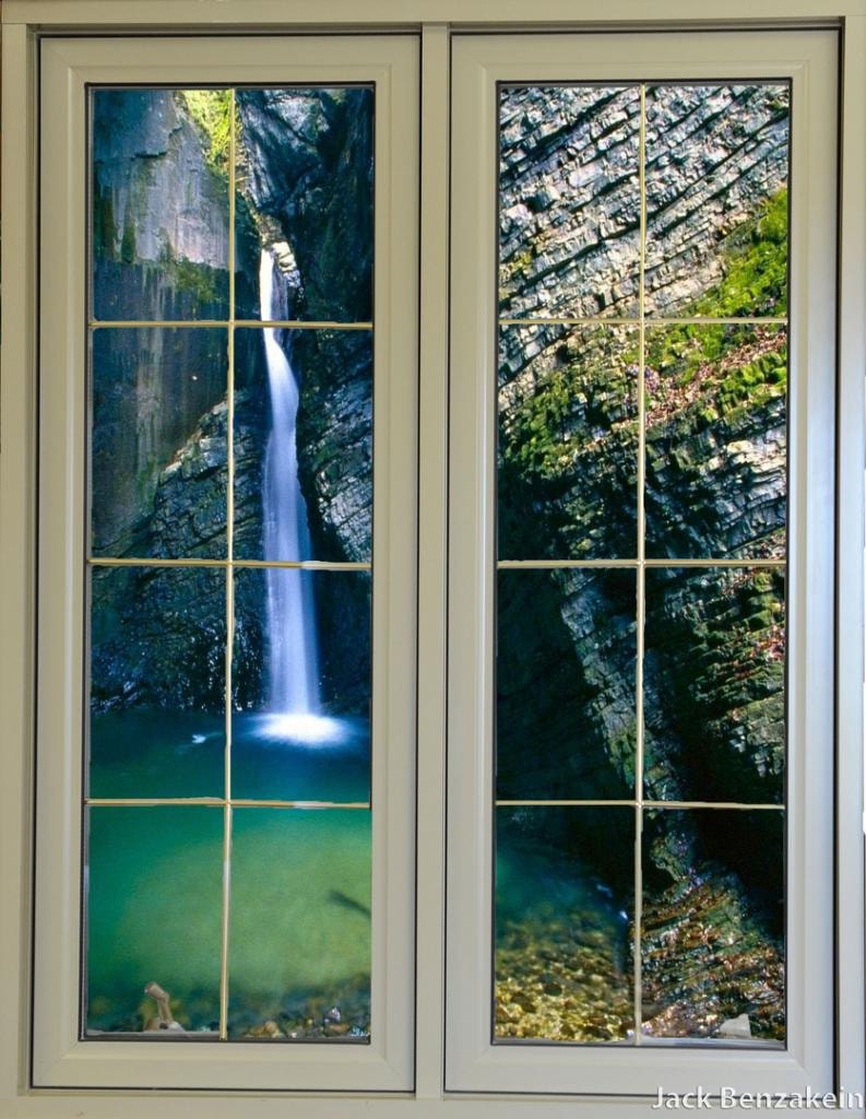 Double casement window waterfall and rock view