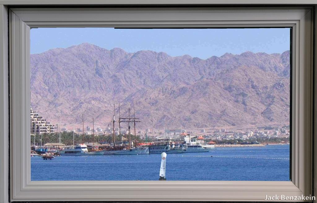 Awning window harbor and mountain view